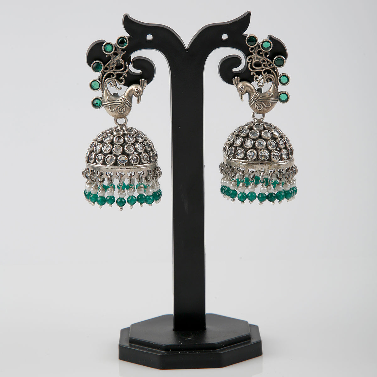 Krishnacrafts Sterling Silver Handcrafted Peacock Jhumka with Green Bead Drops.